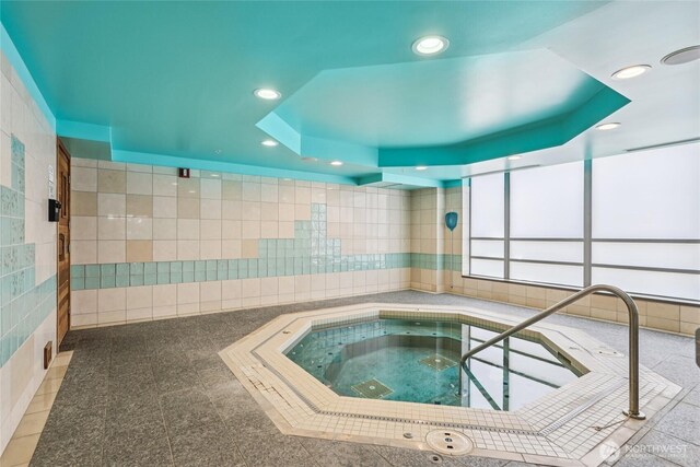 2929 1st Ave Unit 205, Seattle, WA 98121 - view of swimming pool with a hot tub