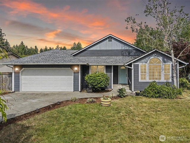5937 Danials Loop SE, Lacey, WA 98513 - ranch-style home with a garage, a yard, driveway, and roof with shingles