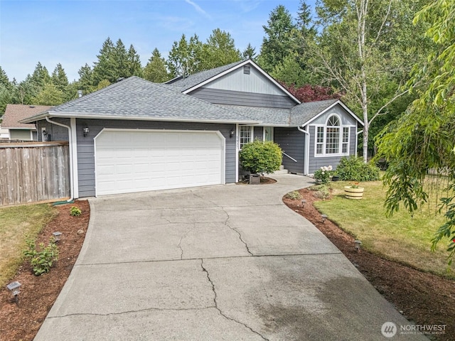 5937 Danials Loop SE, Lacey, WA 98513 - ranch-style house featuring an attached garage, driveway, and roof with shingles