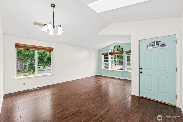 5937 Danials Loop SE, Lacey, WA 98513 - entryway with lofted ceiling, a chandelier, dark wood-style floors, and a skylight