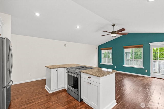 5937 Danials Loop SE, Lacey, WA 98513 - kitchen with appliances with stainless steel finishes, open floor plan, ceiling fan, dark wood-type flooring, and white cabinetry