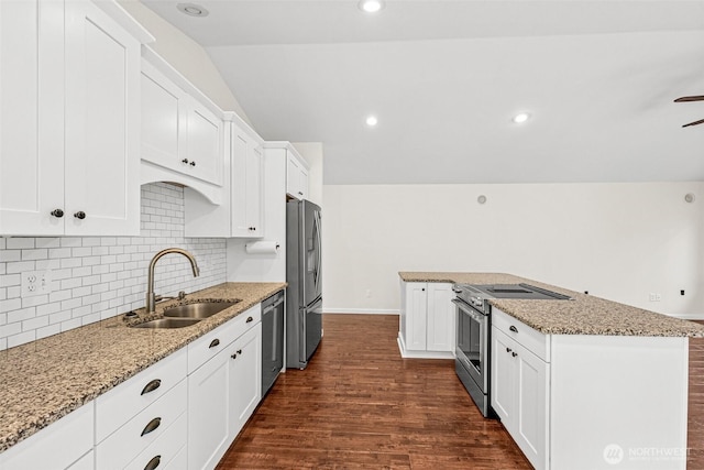 5937 Danials Loop SE, Lacey, WA 98513 - kitchen featuring stainless steel appliances, tasteful backsplash, dark wood-style floors, white cabinetry, and recessed lighting