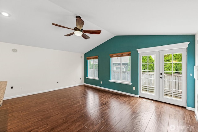5937 Danials Loop SE, Lacey, WA 98513 - empty room with a ceiling fan, wood finished floors, french doors, lofted ceiling, and plenty of natural light