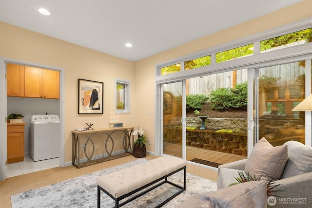 740 1st St S, Kirkland, WA 98033 - living room featuring washer / clothes dryer, light colored carpet, and recessed lighting