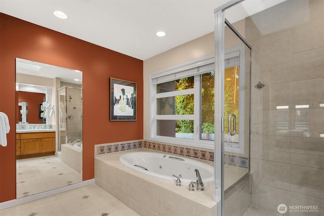740 1st St S, Kirkland, WA 98033 - full bathroom with a stall shower, vanity, a tub with jets, tile patterned flooring, and recessed lighting