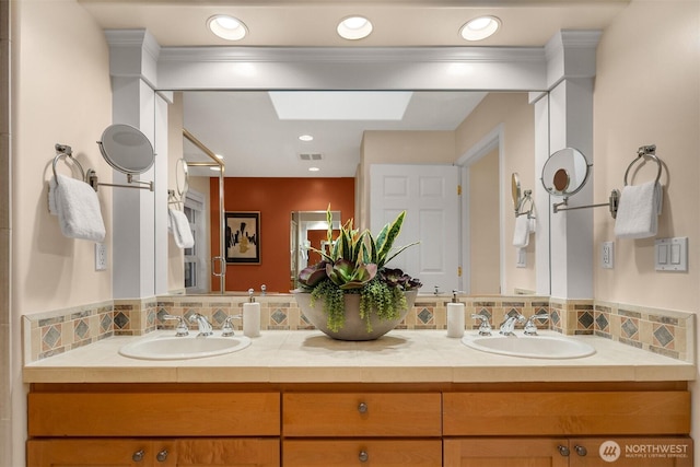 740 1st St S, Kirkland, WA 98033 - bathroom with double vanity and a skylight