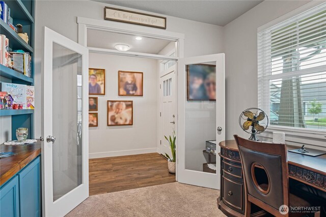 1924 Schneiter Dr, Longview, WA 98632 - carpeted office space featuring french doors and healthy amount of natural light