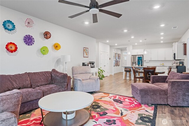 1924 Schneiter Dr, Longview, WA 98632 - living room with light wood-type flooring, a ceiling fan, and recessed lighting
