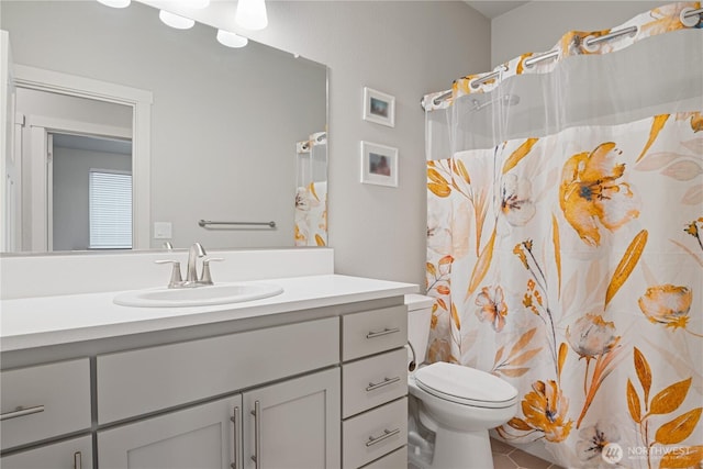 1924 Schneiter Dr, Longview, WA 98632 - bathroom featuring vanity, toilet, tile patterned floors, and a shower with curtain