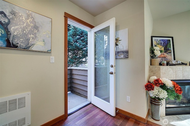 2509NE 125th St, Seattle, WA 98125 - doorway to outside featuring dark wood-type flooring, baseboards, plenty of natural light, and heating unit