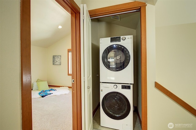2509NE 125th St, Seattle, WA 98125 - laundry area featuring stacked washing machine and dryer, carpet flooring, and baseboards