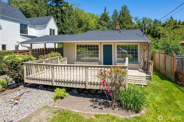 17108 47th Ave NE, Lake Forest Park, WA 98155 - rear view of house featuring a wooden deck, a chimney, and a shingled roof