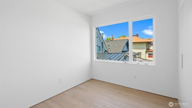 1114 26th Ave Unit B, Seattle, WA 98122 - spare room with wood finished floors and plenty of natural light