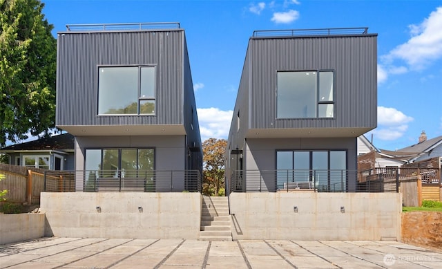 1114 26th Ave Unit B, Seattle, WA 98122 - modern home with a patio area, stairway, and stucco siding
