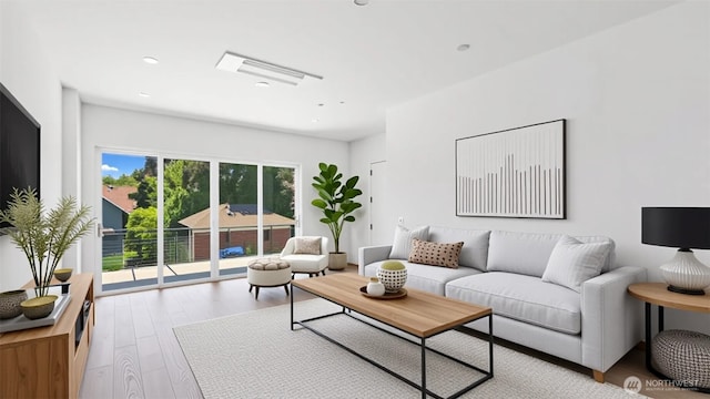 1114 26th Ave Unit B, Seattle, WA 98122 - living room with wood finished floors and recessed lighting