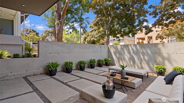 1114 26th Ave Unit B, Seattle, WA 98122 - fenced backyard featuring an outdoor living space and a patio area