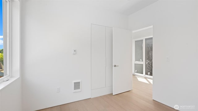 1112 26th Ave Unit A, Seattle, WA 98122 - unfurnished room with light wood finished floors
