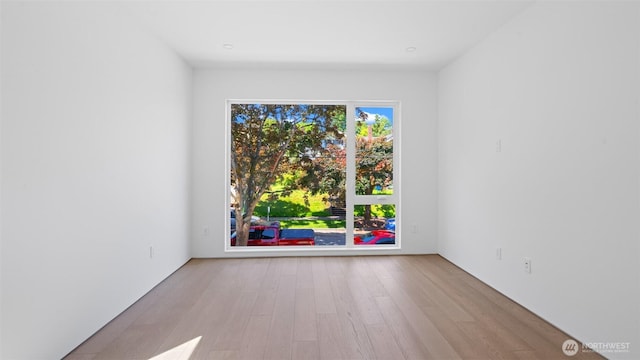 1112 26th Ave Unit A, Seattle, WA 98122 - unfurnished room with wood finished floors