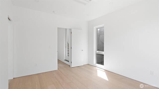 1112 26th Ave Unit A, Seattle, WA 98122 - empty room featuring light wood finished floors