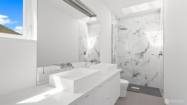 1112 26th Ave Unit A, Seattle, WA 98122 - bathroom with toilet, a marble finish shower, and vanity