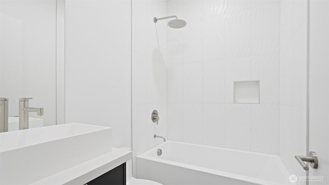 1112 26th Ave Unit B, Seattle, WA 98122 - bathroom featuring vanity, toilet, and shower / washtub combination