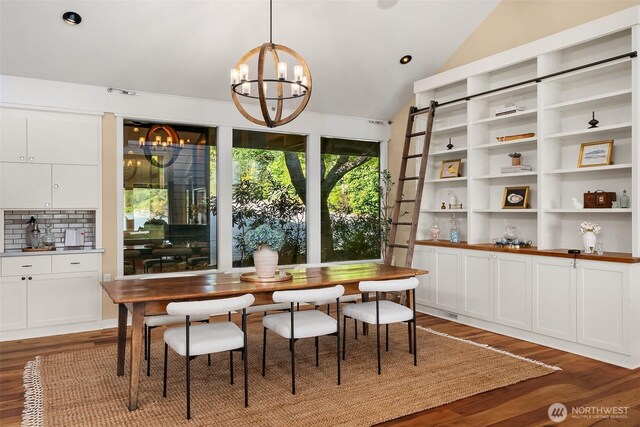 9707 SW Quartermaster Dr, Vashon, WA 98070 - dining room with a chandelier, light wood-style floors, and lofted ceiling