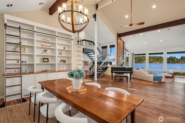 9707 SW Quartermaster Dr, Vashon, WA 98070 - dining area with beam ceiling, stairway, a chandelier, wood finished floors, and recessed lighting