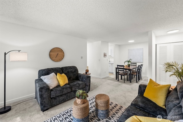 1506 N Defiance St Unit R205, Tacoma, WA 98406 - living room with light carpet and a textured ceiling