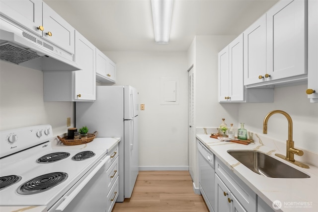 1506 N Defiance St Unit R205, Tacoma, WA 98406 - kitchen with white appliances, under cabinet range hood, light wood-style floors, white cabinetry, and light stone counters