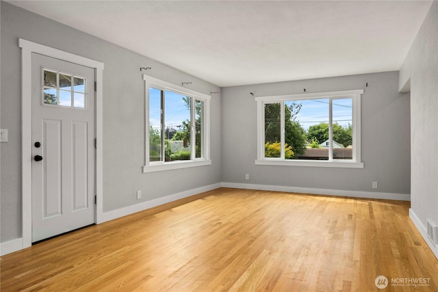 113 W Chenault Ave, Hoquiam, WA 98550 - foyer featuring light wood-type flooring and baseboards