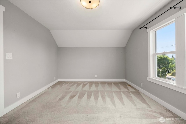 113 W Chenault Ave, Hoquiam, WA 98550 - additional living space with light carpet, vaulted ceiling, and baseboards
