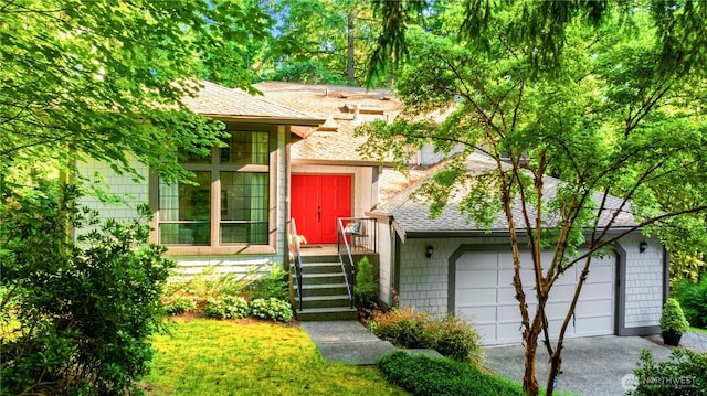 22913 NE 57th St, Redmond, WA 98053 - view of front of home featuring roof with shingles and driveway
