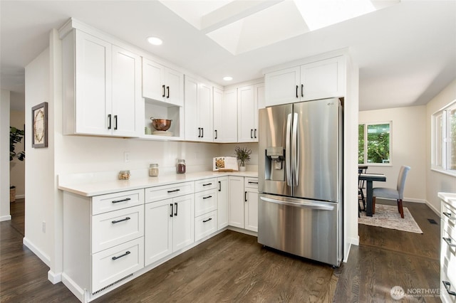 604 N 178th St, Shoreline, WA 98133 - kitchen featuring stainless steel refrigerator with ice dispenser, light countertops, dark wood-style flooring, and recessed lighting