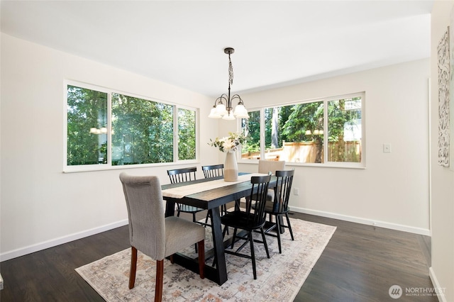 604 N 178th St, Shoreline, WA 98133 - dining room featuring a chandelier, baseboards, and dark wood finished floors