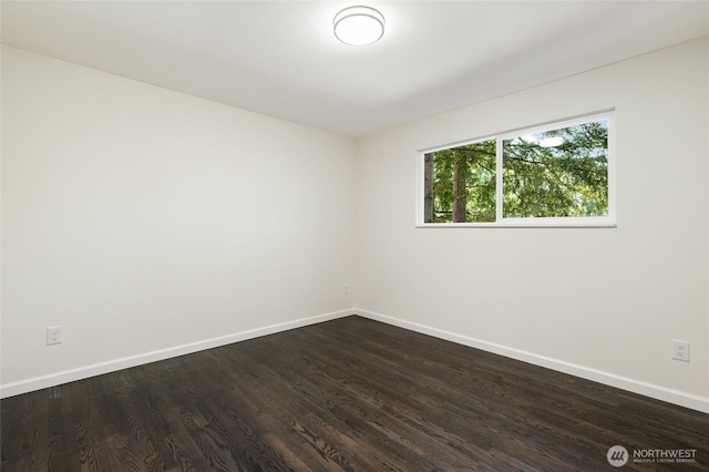 604 N 178th St, Shoreline, WA 98133 - empty room featuring baseboards and dark wood-style flooring