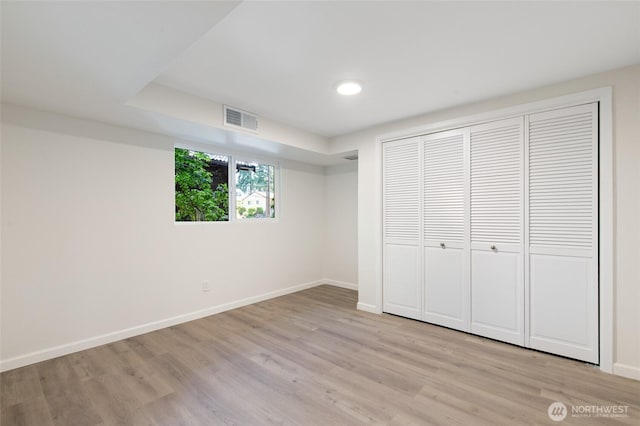 604 N 178th St, Shoreline, WA 98133 - unfurnished bedroom with baseboards, light wood-style flooring, a closet, and recessed lighting