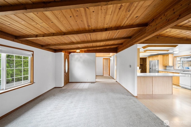 14803 SE 306th St, Kent, WA 98042 - unfurnished living room with wood ceiling with exposed beams, a sink, light carpet, and baseboards