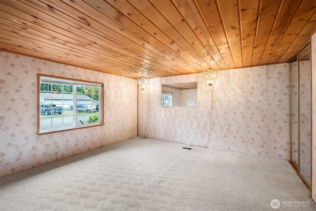 14803 SE 306th St, Kent, WA 98042 - unfurnished room with wallpapered walls, wooden ceiling, and carpet flooring