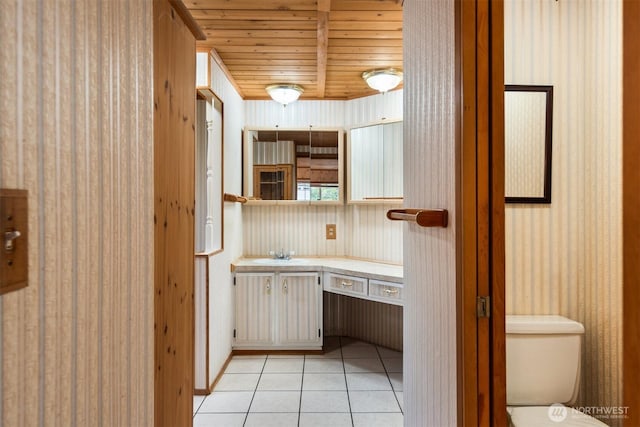14803 SE 306th St, Kent, WA 98042 - kitchen with a sink, light countertops, light tile patterned floors, wallpapered walls, and wooden ceiling