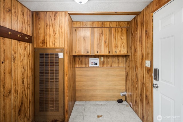14803 SE 306th St, Kent, WA 98042 - laundry room with cabinet space, a heating unit, washer hookup, wood walls, and light marble finish floors