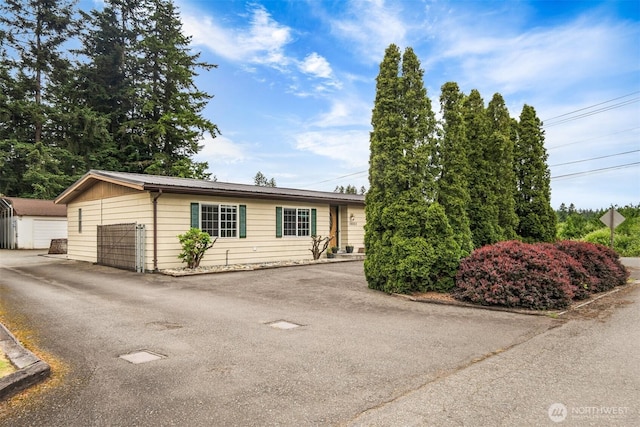 14803 SE 306th St, Kent, WA 98042 - ranch-style house featuring an outdoor structure