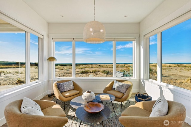 1421 S Cohasset Crst, Westport, WA 98595 - sunroom with plenty of natural light, baseboards, and wood finished floors