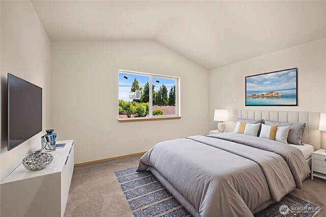 10040 19th Ave SW, Seattle, WA 98146 - bedroom featuring light colored carpet, vaulted ceiling, and baseboards