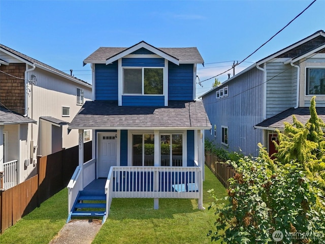 10040 19th Ave SW, Seattle, WA 98146 - traditional home with a shingled roof and covered porch