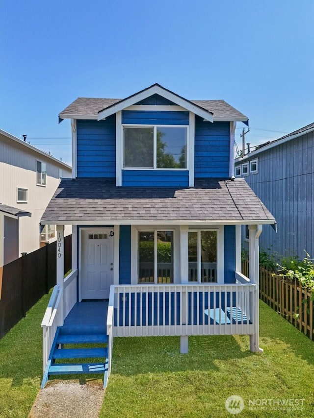 10040 19th Ave SW, Seattle, WA 98146 - view of front facade with covered porch and a shingled roof