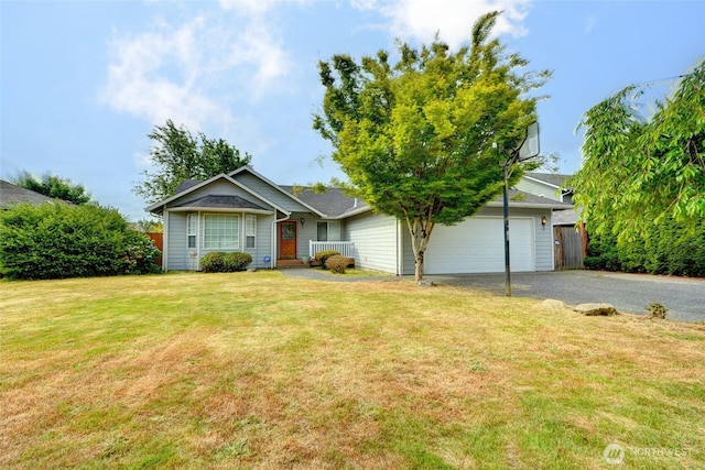 4708 203rd St NE, Arlington, WA 98223 - view of front of property with asphalt driveway, a garage, and a front yard