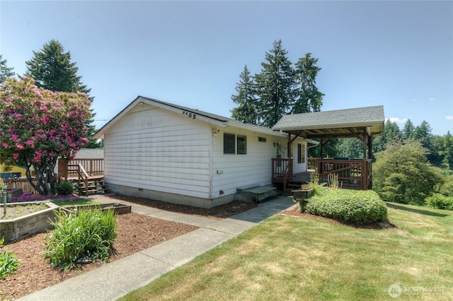 4103 Ward Lake Ct SE, Olympia, WA 98501 - view of front of property featuring a front yard, a wooden deck, and crawl space