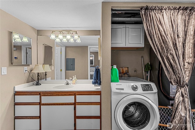 8903 Crescent Bar Rd NW Unit 18, Quincy, WA 98848 - laundry room featuring washer / dryer and electric panel