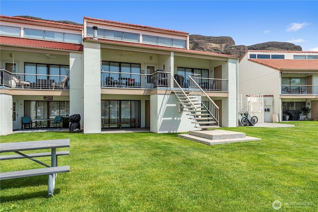 8903 Crescent Bar Rd NW Unit 18, Quincy, WA 98848 - view of building exterior featuring stairs and a mountain view