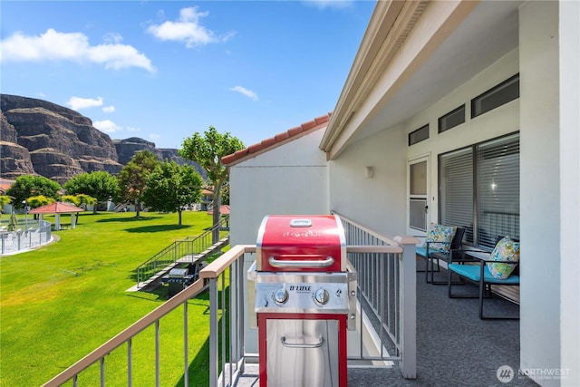 8903 Crescent Bar Rd Unit 158, Quincy, WA 98848 - view of patio / terrace with a balcony, a mountain view, and a grill